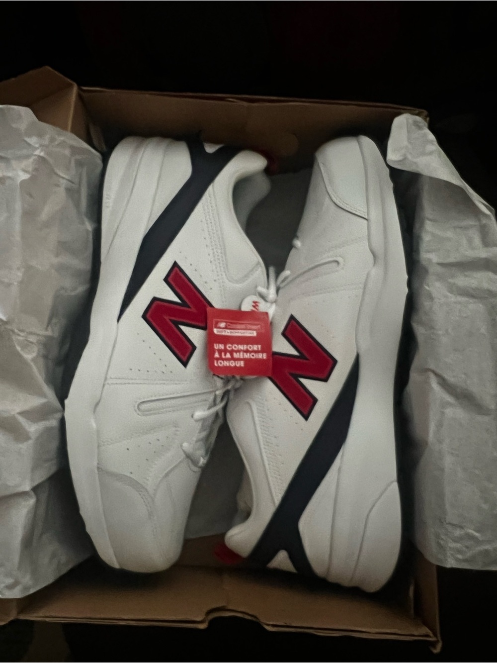 New Balance Men's White Leather Sneakers with Red 'N' and Navy Accents